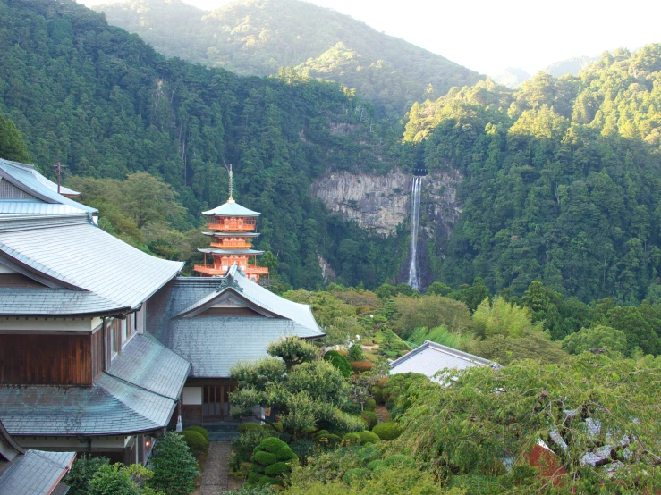 a mountain view with tall, steep buildings on both sides