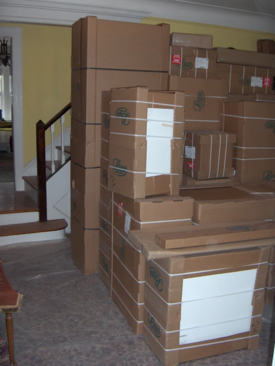 there are lots of boxes stacked high next to each other