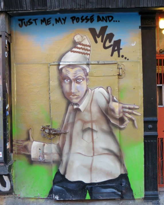 graffiti art showing a man with hat on his head