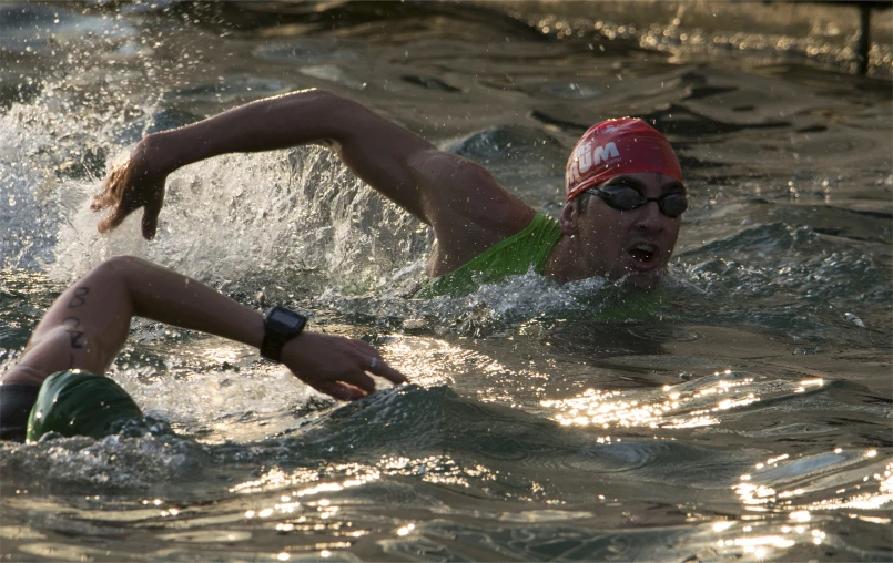 a swimmer in the water in his swimming gear