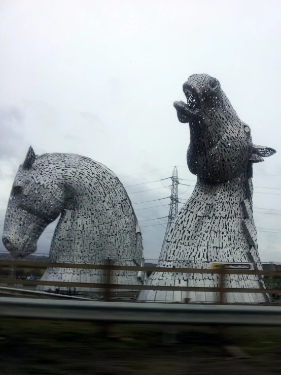 the large sculptures are shaped like animals on display