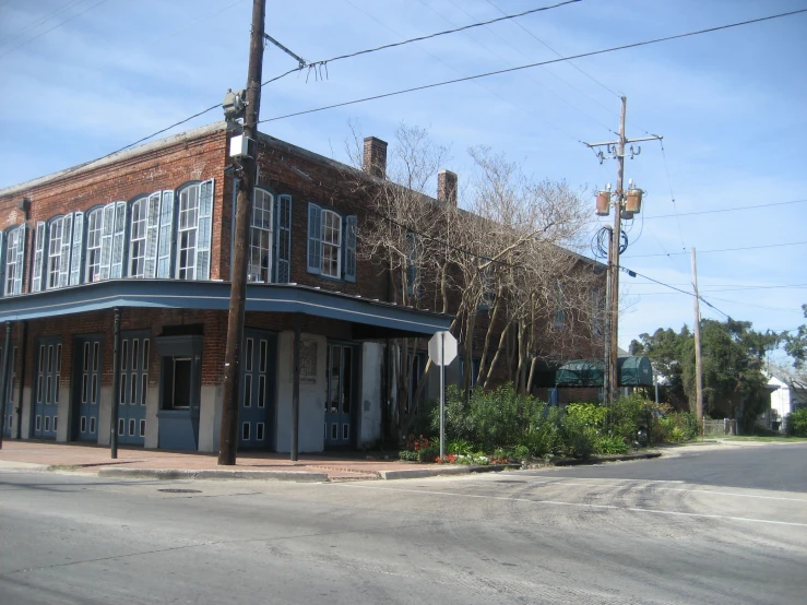 old dilapidated looking building in rural town by the street