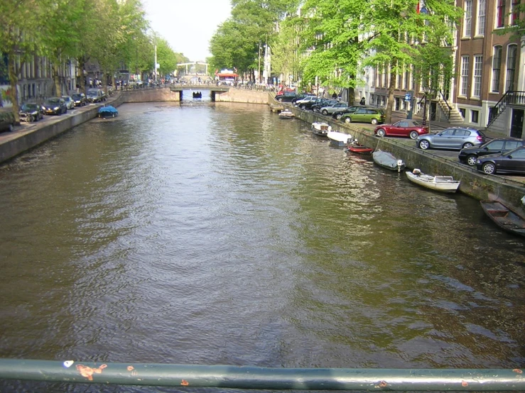 a long canal with several boats on it