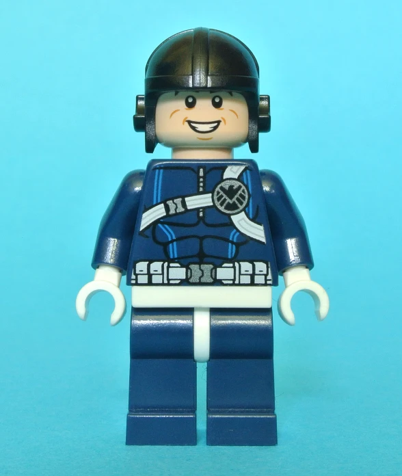 the lego figure is wearing a black helmet and blue uniform