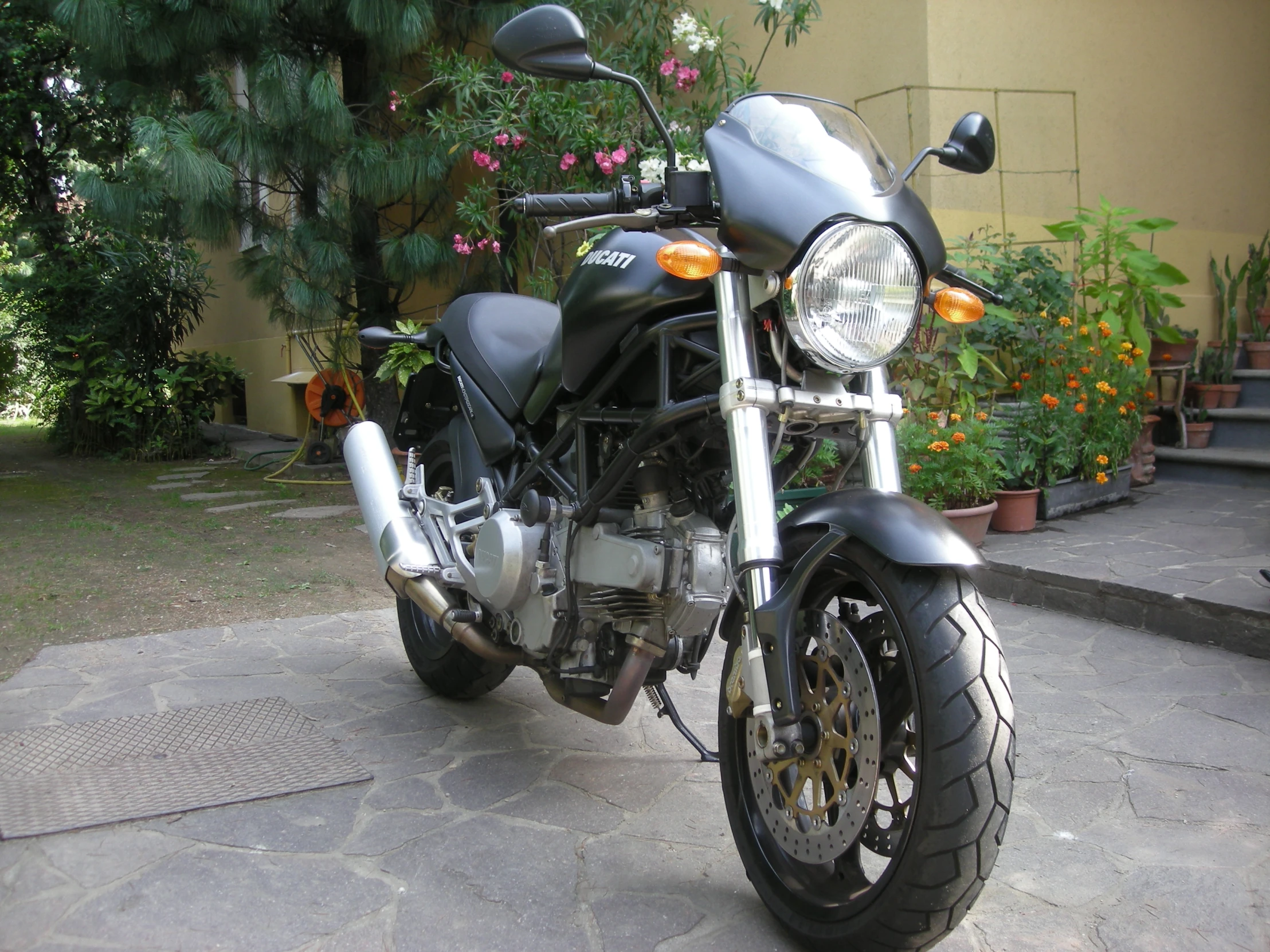 a motorcycle that is parked outside on a cement