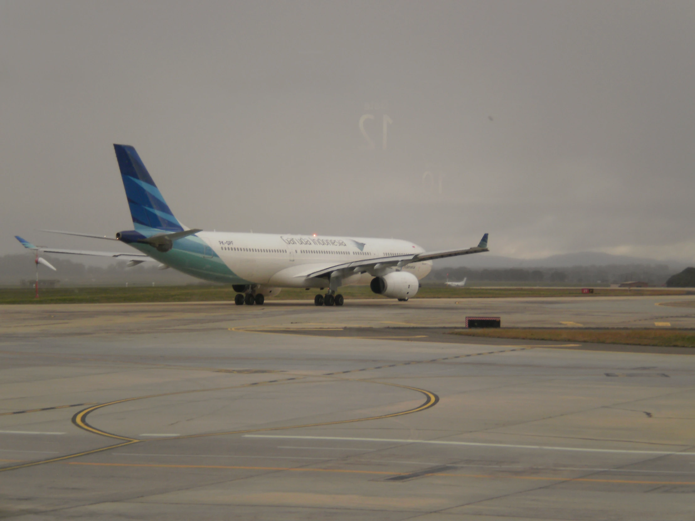 an airplane that is sitting on the runway