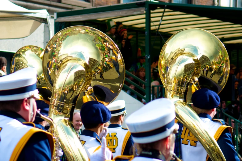 a group of people in uniform playing ss instruments