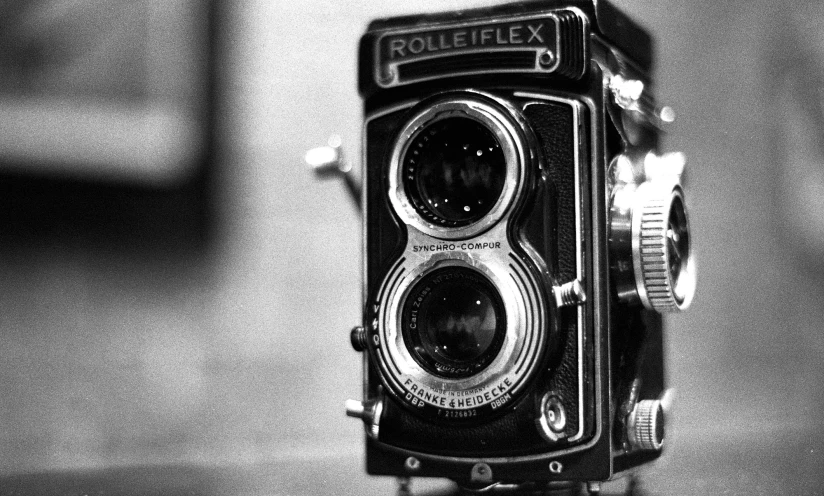 a camera is sitting in front of a window