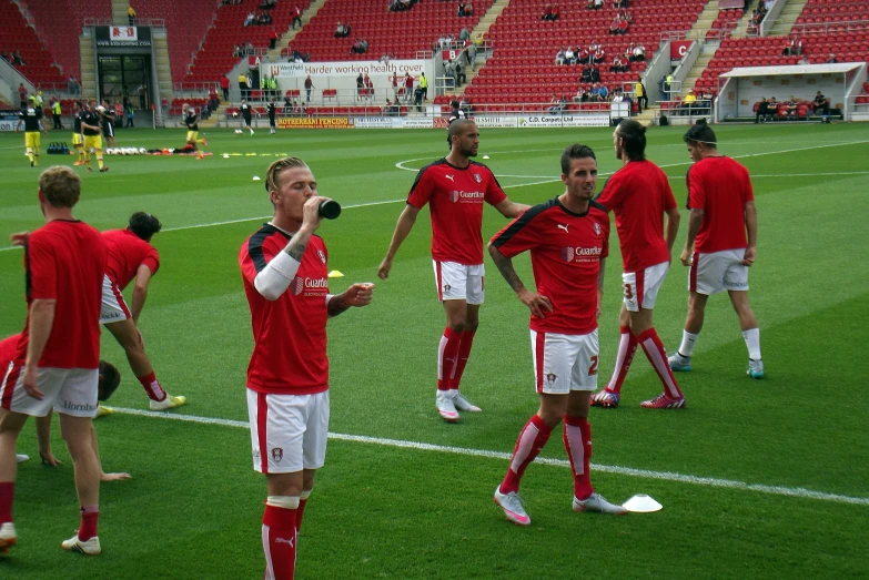 a group of players standing on a field