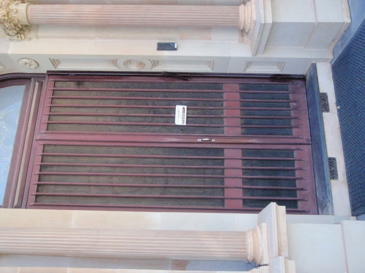 the door to the building is closed with metal bars