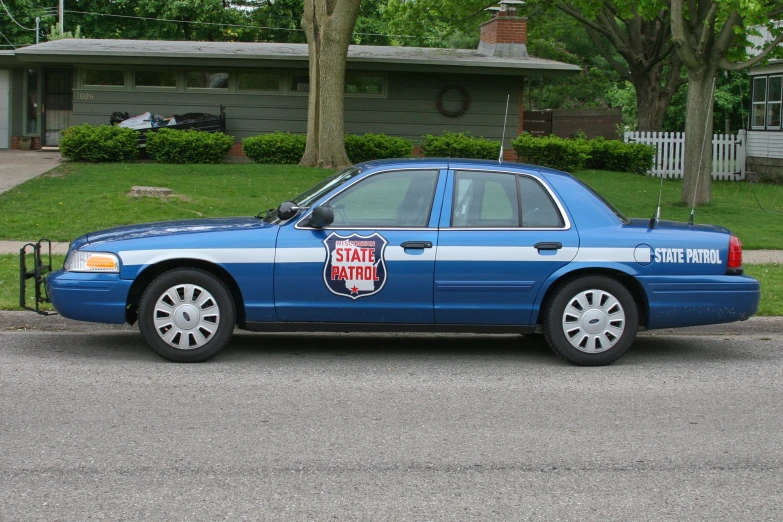 a police car parked on the side of the street