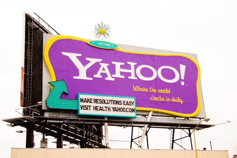 yahoo billboard with the name on it against an overcast sky