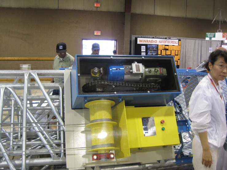 a woman walking towards an automated machine