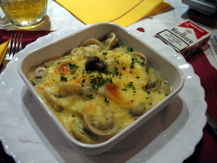 a close up of a bowl of food on a plate