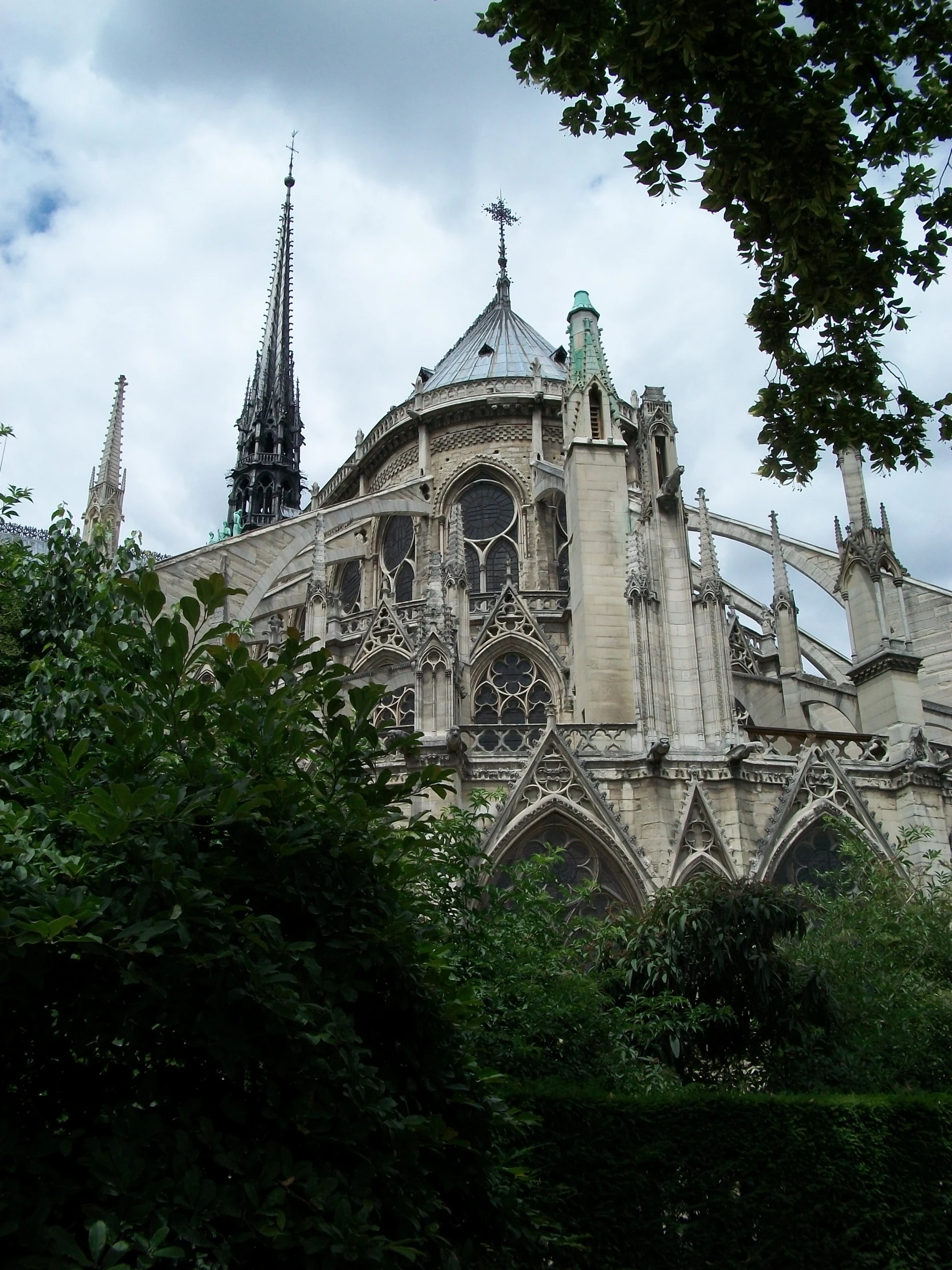 the steeples of a gothic style building, with a spires