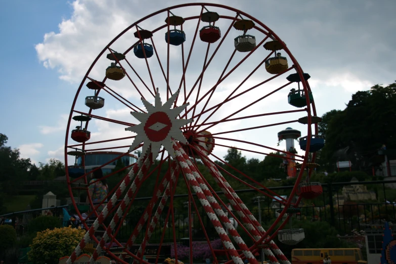 a ferris wheel is sitting in the park