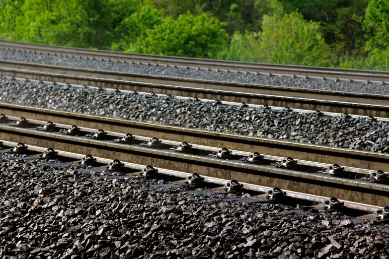 a large group of train tracks with several rocks