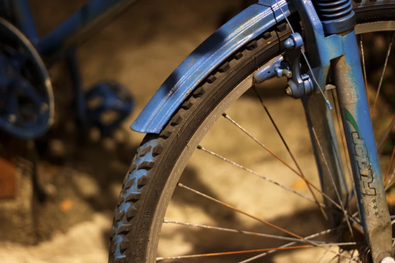 a close - up view of the spokes and tire on a bicycle
