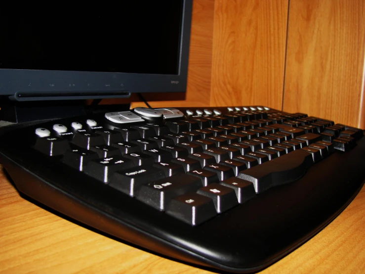 a close up of the keyboard and mouse of an apple computer