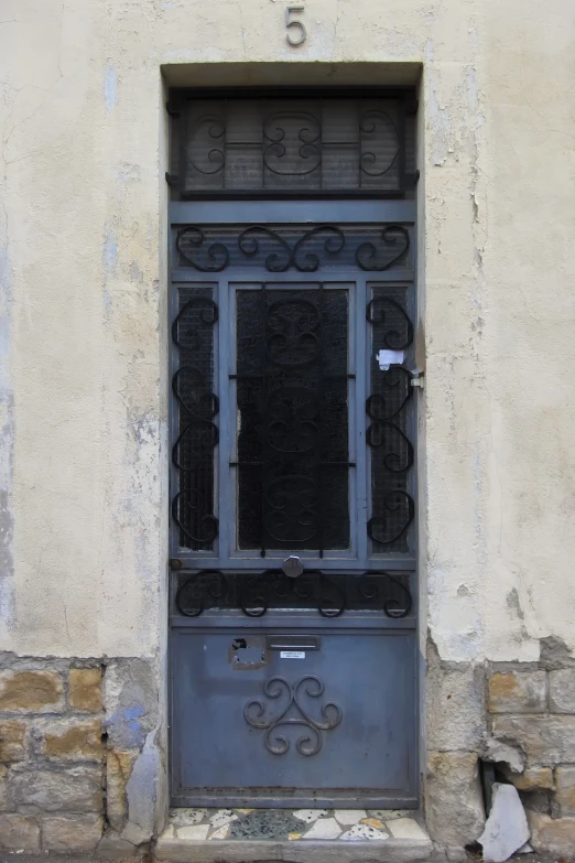 the door is a closed square with an iron frame