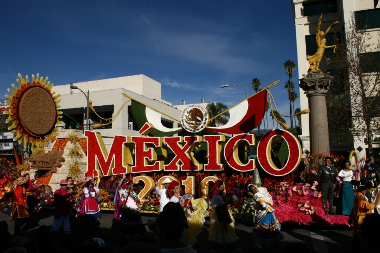 the large sign that says mexico outside of a building