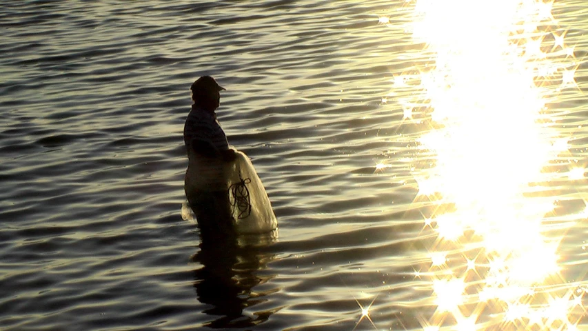 a large plastic bottle floating in a lake