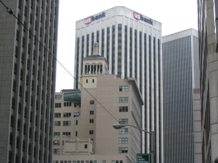 a view of the top part of buildings from a street