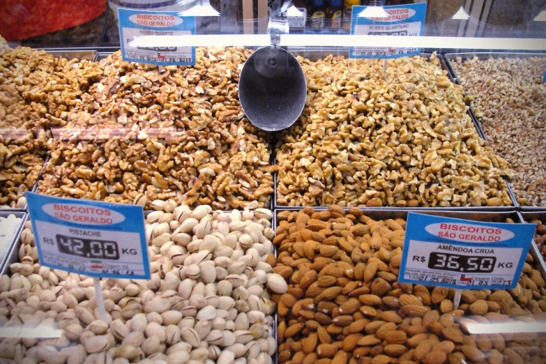several varieties of nuts in a store display