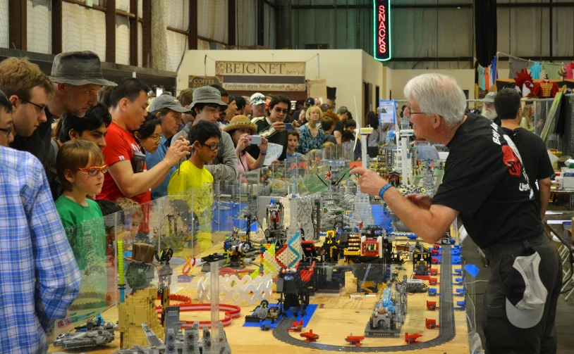 an open display of building model made from legos at an expo