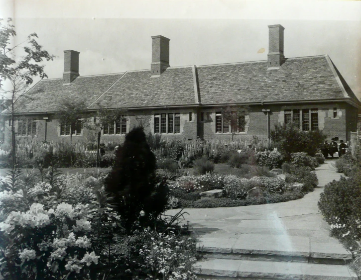 there is a black and white picture of a house