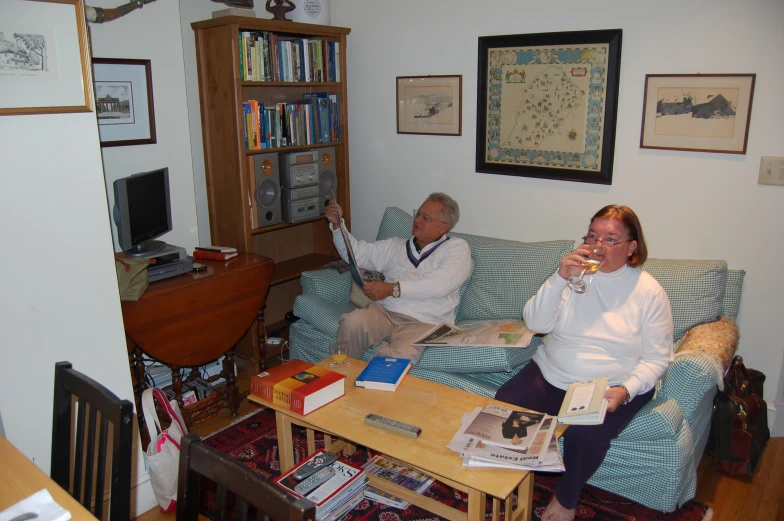 two people in the middle of a living room