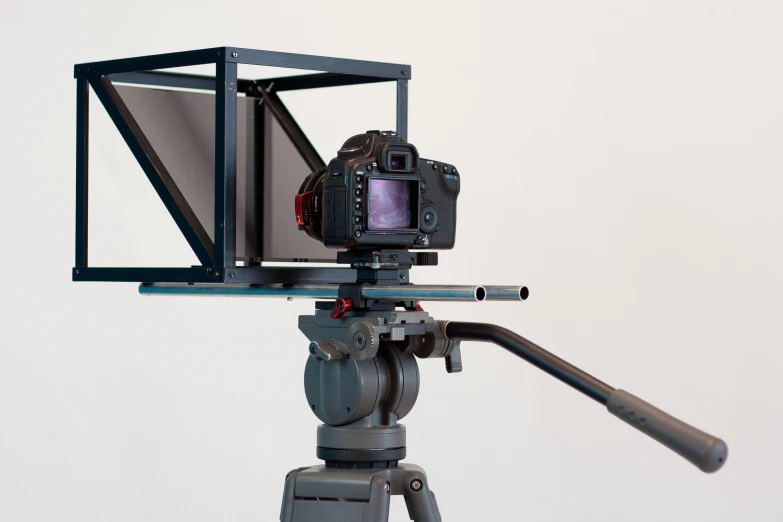 an equipment set up with a camera and some items attached