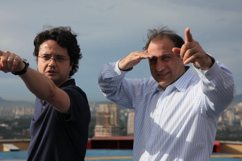 two men that are standing in the street