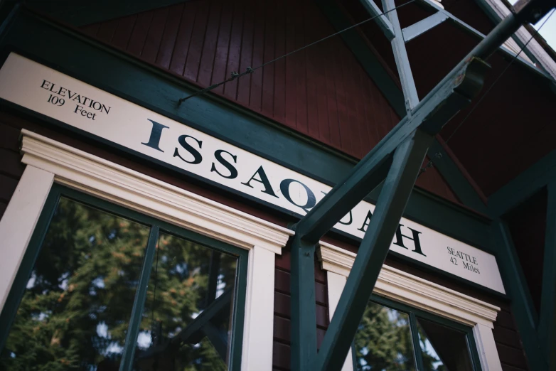 the name of an establishment on a red brick building