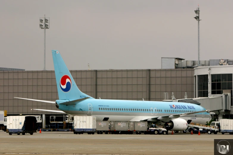 an air plane that is being prepared to go down the runway