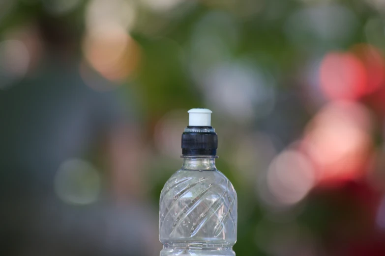 a plastic bottle with a lid on a table