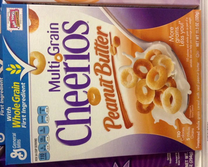 a package of cheerios with peanut er on top