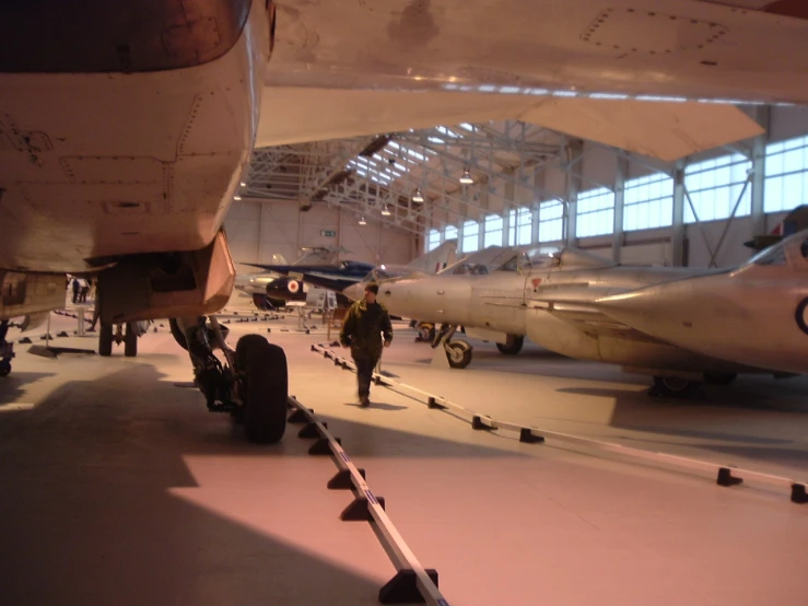 an inside s of a museum with planes