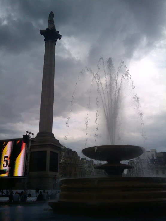 the water fountain is spinning out in the sky