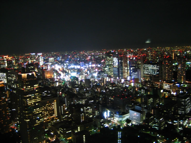 the city lights are bright at night in japan