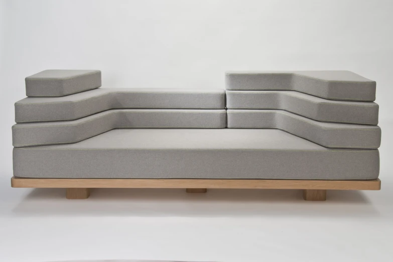 a group of sofas that are on a table