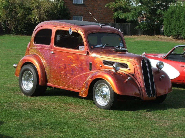 a car that is sitting in the grass