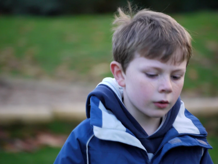 a  who is holding a frisbee in his hands