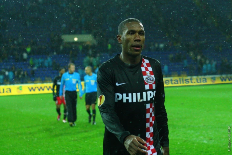 soccer player with scarf on during a game