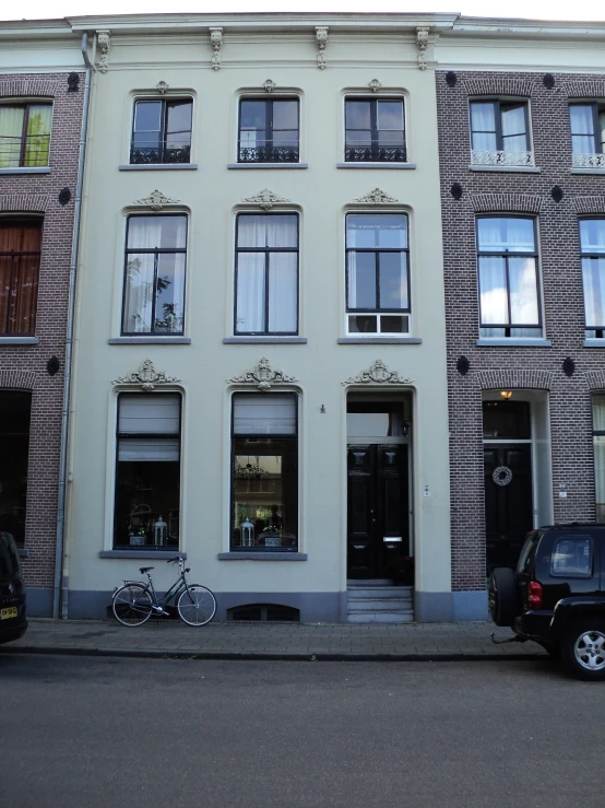 a building with bicycles parked in front of it