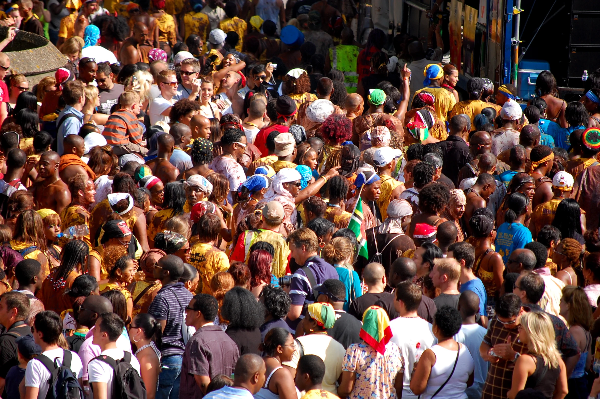 a large group of people are walking in a large crowd