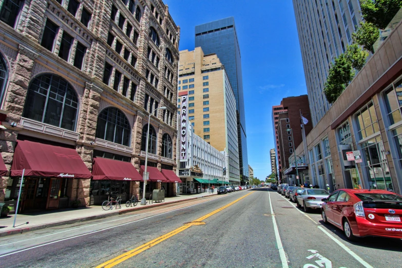 there is a bicycle path going in front of buildings