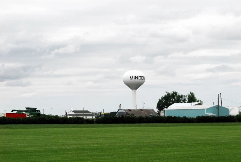 the water tower near the city has the word thinkag on it