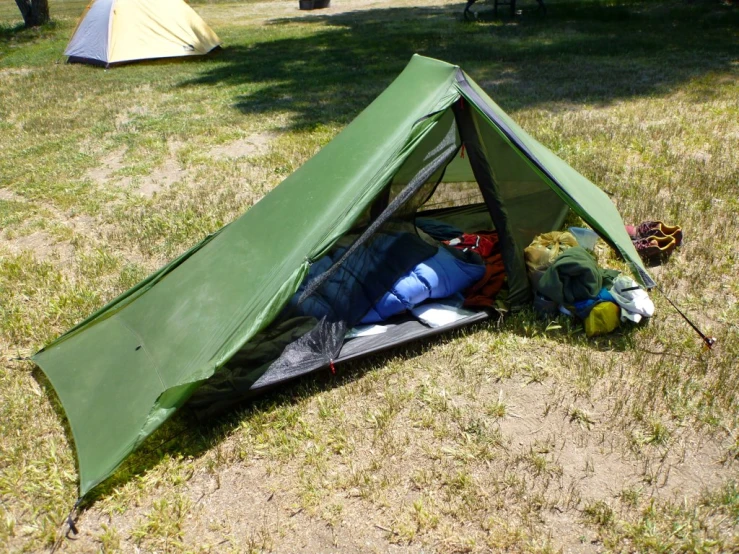 a large tent pitched up on the ground