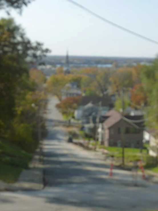 an image of view of a street that is winding